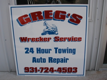 Greg's Wrecker Service Sign